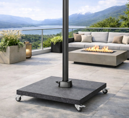 Base MODENA con ruedas instalada en una terraza.