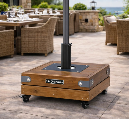 Base DADO 2 instalada en una terraza de hostelería con sombrilla lateral.