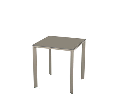 Mesa MEET de Ezpeleta en color taupe, destacando su estructura de aluminio lacado y tablero compacto de alta densidad.