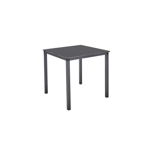 Mesa MÓNACO de Ezpeleta, resaltando su estructura de aluminio y su tablero compacto de alta resistencia.