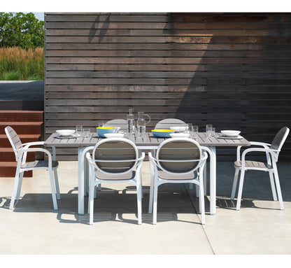 Comedor exterior completo con la mesa ALLORO y seis sillas PALMA a conjunto.