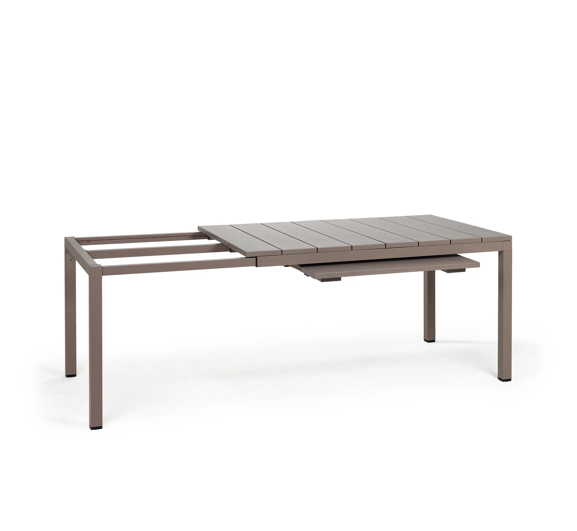 Mesa extensible RIO de Nardi en pleno proceso de apertura, mostrando su sistema fluido y su diseño listonado de alta gama.